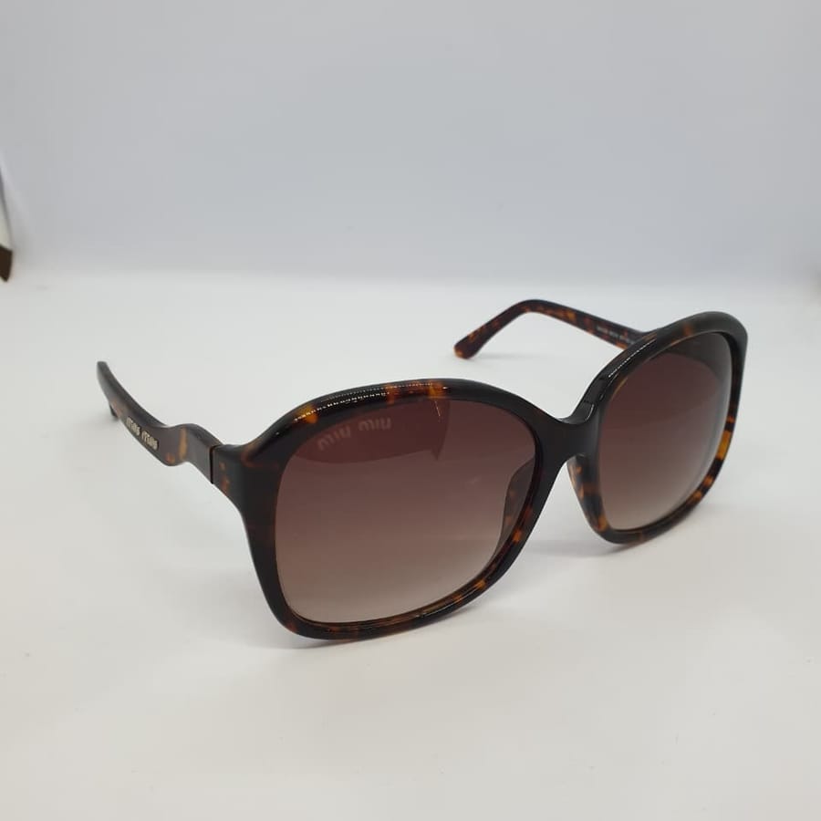 & MIU MIU #8 · Black tiger brown — MIU MIU